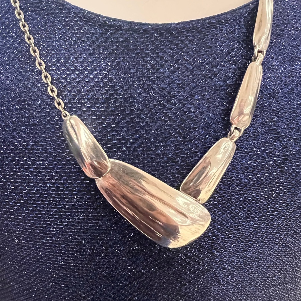 .925 sterling silver Silpada retired necklace with an asymmetric design.